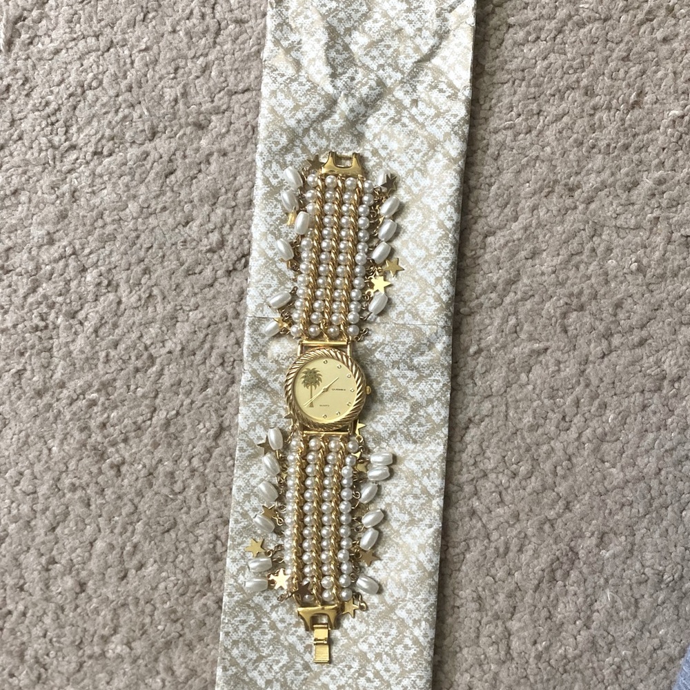 Gold pearl watch